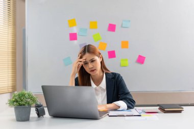 Concept of modern girl leadership, Businesswoman is worried while reading financial data document.