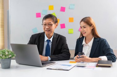 Business partnership concept, Senior in business are explain and suggestion startup data to partner.