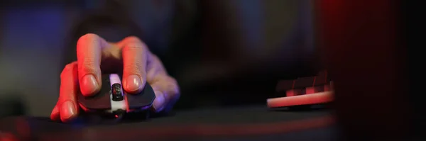 stock image Hand of male cyber hacker gamer on mouse to playing games or hacking programming system.