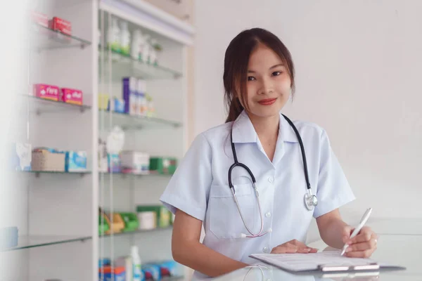 Medicine Health Concept Female Pharmacist Writing Prescription Side Effect Document — Stock fotografie