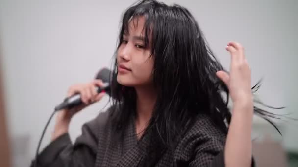 Asian Woman Blow Drying Her Hair Front Large Mirror Washing — Stock videók