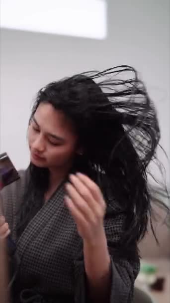 Asian Woman Blow Drying Her Hair Front Large Mirror Washing — Stock video