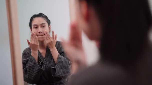 Asian Woman Applying Face Cream Nourish Her Skin Front Large — Stock videók