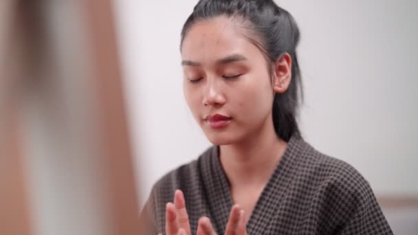Asian Woman Applying Face Cream Nourish Her Skin Front Large — Stock videók