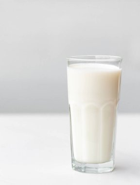 glass of milk on the table clipart