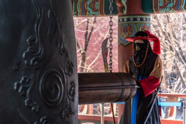 Korean royal guards in historical Joseon costumes at the Bosingak Bell Pavilion in Seoul South Korea on 4 February 2023 clipart