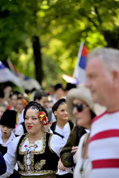 stock image Young people wearing folklore costumes during the All-Serb Assembly rally in Belgrade, capital of Serbia, on 8 June 2024