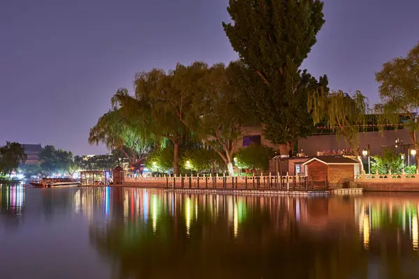 stock image Night view of the Shichahai historic scenic area consisting of three lakes in central Beijing, China, on 21 April 2024
