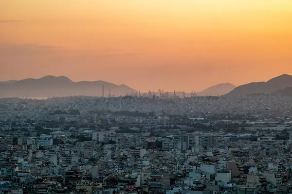 stock image Aerial cityscape view of Athens capital of Greece during sunset, view from Lycabettus hill, on 16 August 2023