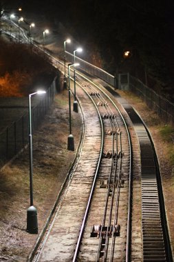 Railway tracks of Petrin funicular linking the Mala Strana district with the top of Petrin hill in Prague, capital of Czech Republic clipart