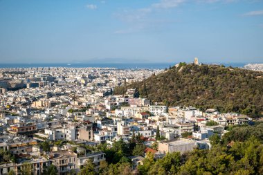 Atina 'nın başkenti Yunanistan' ın panoramik havadan manzarası, 15 Ağustos 2023 'te antik Akropol tepesinden görülüyor