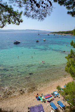 Zlatni rat (Golden Horn) beach in town of Bol on the southern coast of the island of Brac in Adriatic Sea, Dalmatia region of Croatia, on 24 August 2024 clipart