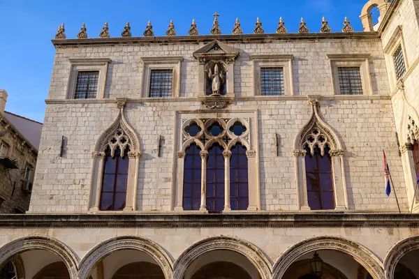 stock image Large Onofrio's Fountain, circular springwater fountain built in 1438 and decorated with ornate, carved-stone masks in Old Town Dubrovnik, Croatia