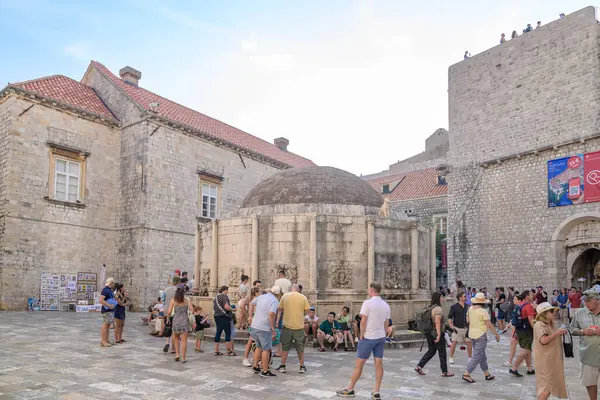 stock image Large Onofrio's Fountain, circular springwater fountain built in 1438 and decorated with ornate, carved-stone masks in Old Town Dubrovnik, Croatia