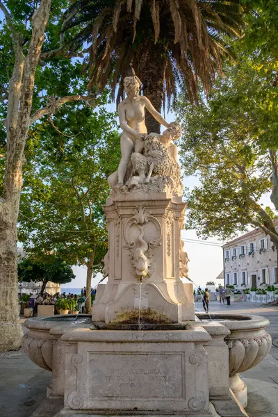 stock image Large Onofrio's Fountain, circular springwater fountain built in 1438 and decorated with ornate, carved-stone masks in Old Town Dubrovnik, Croatia