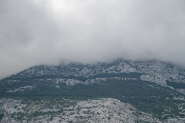 View of the Biokovo mountain range of the Dinaric Alps from Makarska riviera, Adriatic sea coast of Croatia clipart