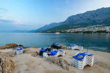 View of Makarska town, popular tourist seaside summer resort on the Adriatic sea coastline of Croatia on 22 August 2024 clipart