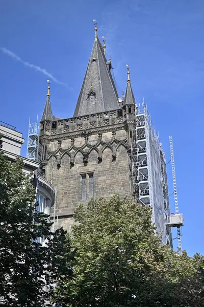 stock image Renovation works on Powder Gate gothic tower (Prasna brana), historical landmark in Prague, Czech Republic on 20 September 2024