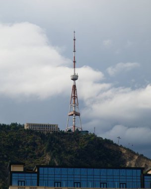 Tbilisi TV broadcasting communications tower located in Mtatsminda Park above Tbilisi, capital of Georgia clipart