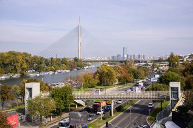 Ada Ciganlija with Ada Bridge, a cable-stayed bridge over the Sava river in Belgrade, Serbia on 24 October 2024 clipart