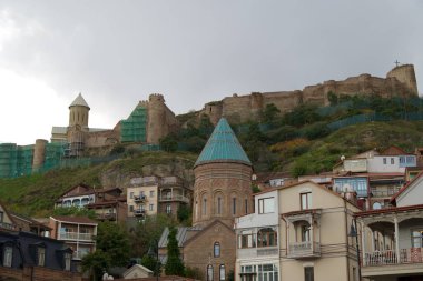 Ancient Narikala fortress overlooking Old town of Tbilisi, the capital of Georgia on 21 October 2024 clipart