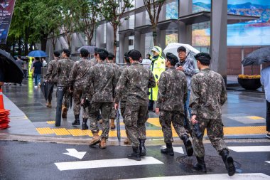 Korean soldiers march during Arms Forces Day military parade of Korean Army in Seoul capital of South Korea on 26 September 2023 clipart