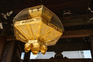 Golden lantern at Higashi Honganji temple of Jodo Shin Buddhism in central Kyoto, Japan on 1 April 2018 clipart