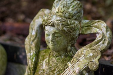 Buddhist statue at the Shipporyuji Shingon Buddhist temple in Inunaki mountain in Izumisano, Osaka, Japan on 3 May 2018 clipart