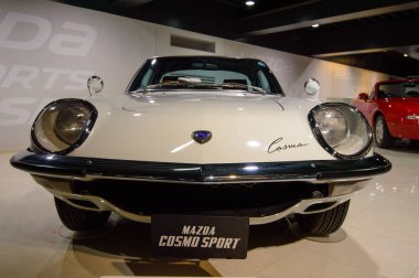 Old cars exhibited in Mazda car museum and assembly plant exhibition in Hiroshima, Japan on 20 December 2017 clipart