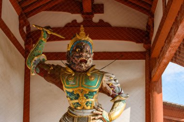 Buddhist statue in Yakushi-ji temple, one of the most famous ancient Buddhist temples in Japan, built in 680 AD in Nara, Japan clipart