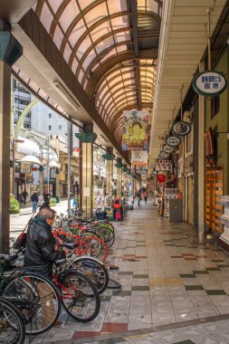 Shinsekai neighbourhood in south Osaka downtown Minami area, famous for many restaurants, shops, bars and pachinko parlours on 28 December 2017 clipart