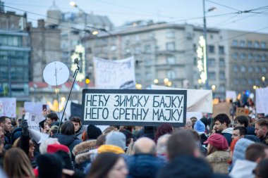 Serbian students and citizens protest against government corruption after Novi Sad railway station accident, in Slavija square in Belgrade, Serbia on 22 December 2024 clipart