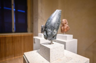 Ancient Egyptian artifacts exhibited in the Neues Museum, New Museum in Museum Island complex in historic center of Berlin, Germany, on 2 January 2025 clipart