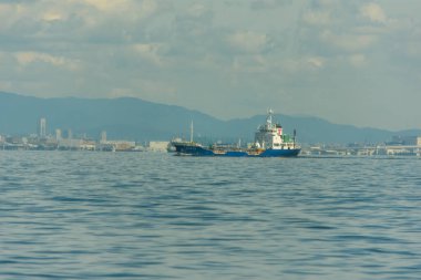 Port of Kobe is a Japanese maritime port in Kobe, Hyogo in the greater area of Osaka bay, in Kobe, Japan on 8 October 2017 clipart