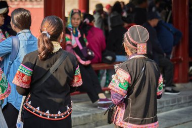 Tourists visiting landmark of Temple of Heaven, where emperors of the Ming and Qing dynasties prayed to Heaven for good harvest, in Beijing, China on 21 April 2024 clipart