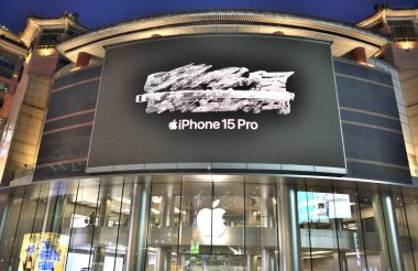 Huge Apple retail store in Wangfujing Avenue, main pedestrian and shopping area in downtown Beijing, China on 18 April 2024 clipart