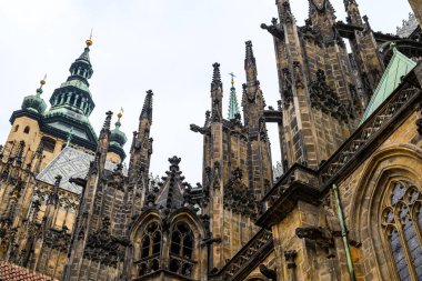 Architectural details on the facade of the St. Vitus Metropolitan Catholic Cathedral in the Prague Castle complex in Prague, Czech Republic on 7 February 2025 clipart