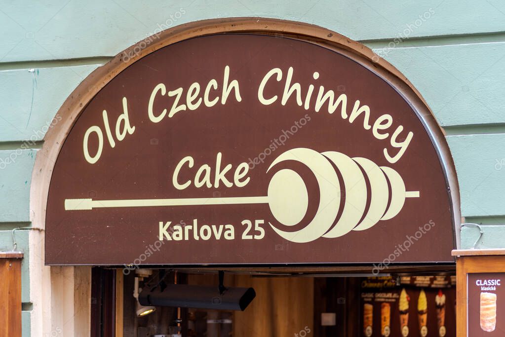 Sign for Old Czech Chimney Cake shop on Karlova 25 Street in Old town of Prague, Czech Republic on 3 July 2024