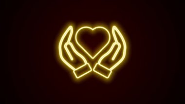 Parlayan neon çizgisi. El simgesindeki kalp, siyah arkaplanda izole edilmiş. El çabukluğu aşk sembolü. Sevgililer Günü sembolü. 4K Video hareketli grafik canlandırması.