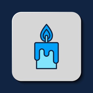 Filled outline Burning candle icon isolated on blue background. Cylindrical candle stick with burning flame. Vector.