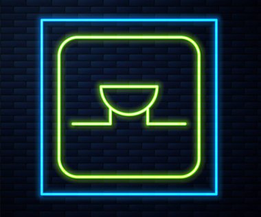 Glowing neon line Buzzer in electronic circuit icon isolated on brick wall background. Vector.