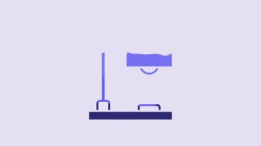 Blue Table lamp icon isolated on purple background. 4K Video motion graphic animation.