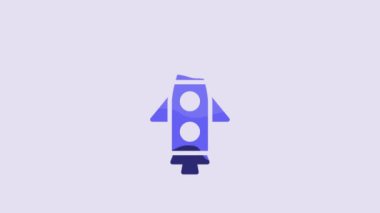 Blue Rocket ship icon isolated on purple background. Space travel. 4K Video motion graphic animation.