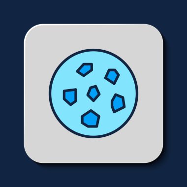 Filled outline Cookie or biscuit with chocolate icon isolated on blue background.  Vector