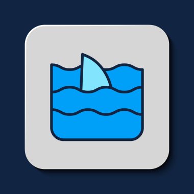 Filled outline Shark fin in ocean wave icon isolated on blue background.  Vector