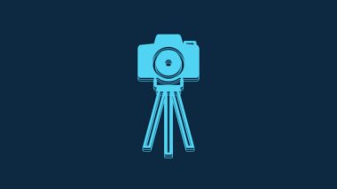 Blue Photo camera icon isolated on blue background. Foto camera. Digital photography. 4K Video motion graphic animation.