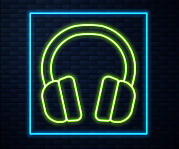 Świecący Neon Linii Słuchawki Ikona Izolowane Tle Cegły Ściany Słuchawki — Wektor stockowy