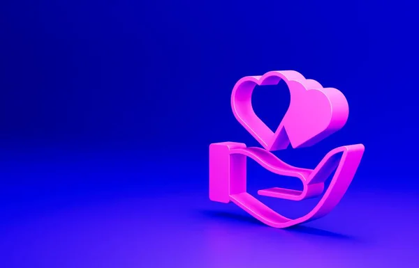 Рожеве Серце Ручній Іконі Ізольоване Синьому Тлі Рука Дарує Символ — стокове фото