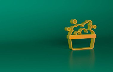 Yeşil zemin üzerinde sabun köpüğü olan turuncu plastik leğen. Sulu kase. Çamaşır yıkama, temizlik malzemeleri. Minimalizm kavramı. 3 Boyutlu resimleme.