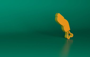 Yeşil arka planda izole edilmiş turuncu korkunç zombi parmak ikonu. Mutlu Cadılar Bayramı Partisi. Minimalizm kavramı. 3 Boyutlu resimleme.